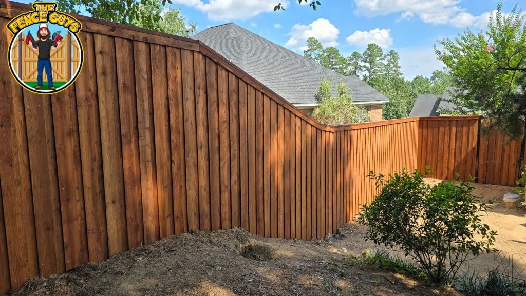 Why Two Fence Quotes for the Same Yard Can Differ by $4,000 3 Curved wooden fence in backyard